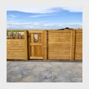 horizontal cedar fence boards and decorative gate insert